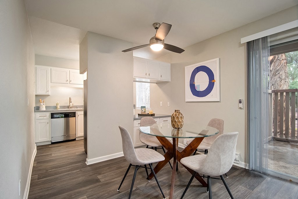 Ceiling Fan, Dinning Table in Living Room at St. Charles Oaks Apartments, Thousand Oaks, CA