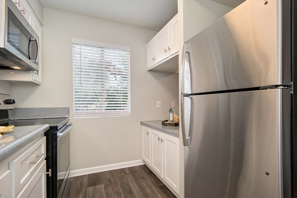 Fridge In Kitchen at St. Charles Oaks Apartments, Thousand Oaks, California