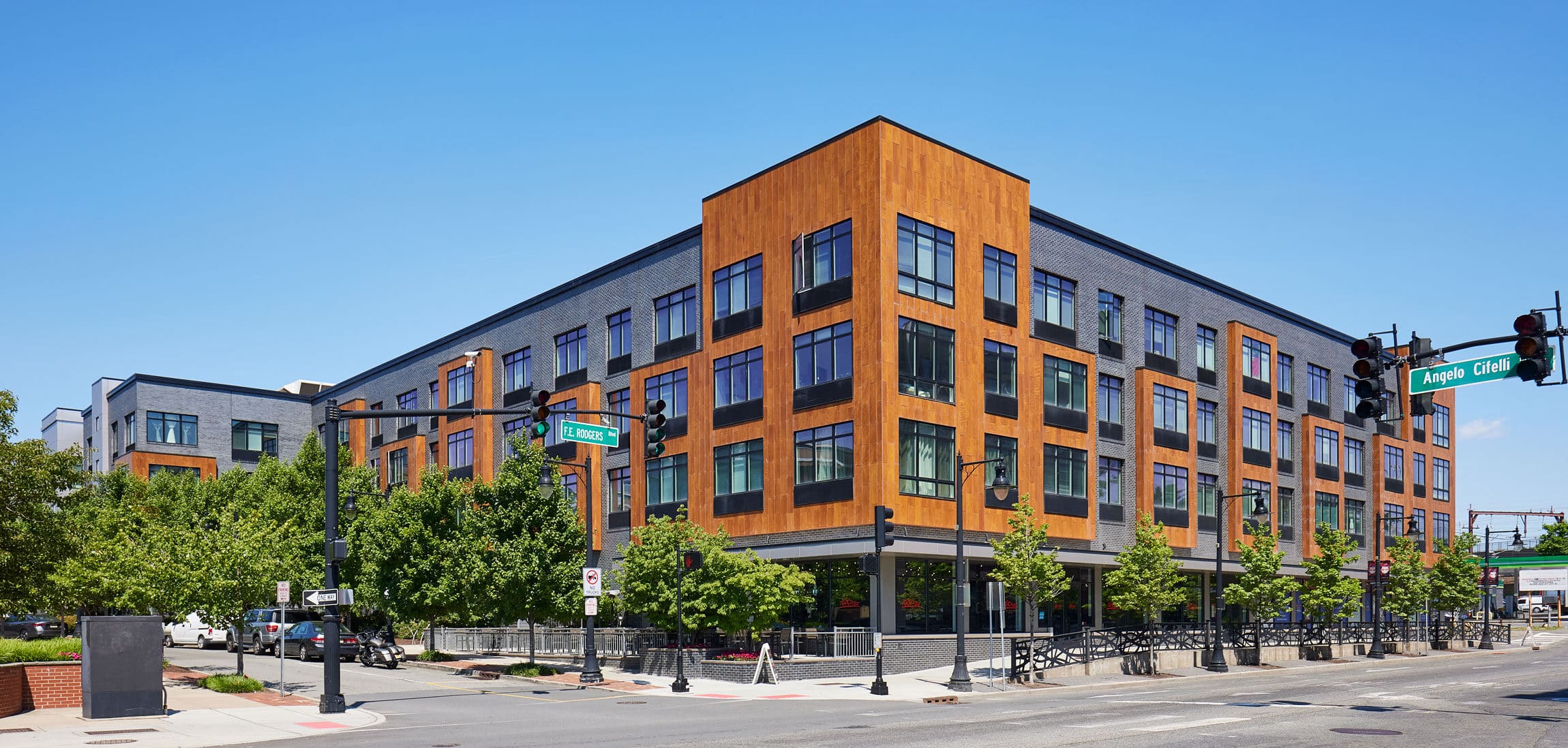 a large building on the corner of a street