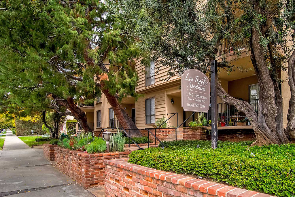 Welcoming Property Sign Green Space at Los Robles Apartments, Pasadena