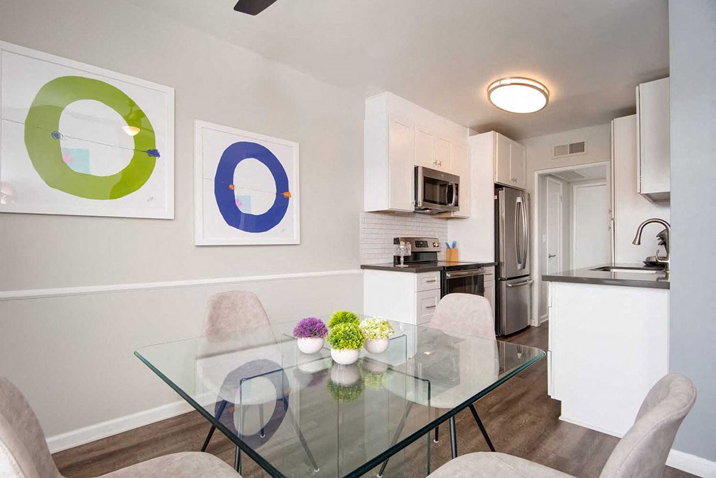 Glass table in Living Room at Los Robles Apartments, California