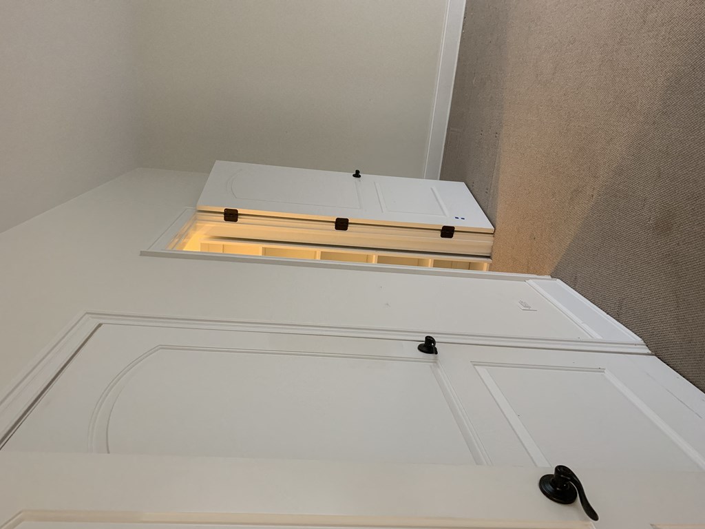 the top of the closet with the drawer open