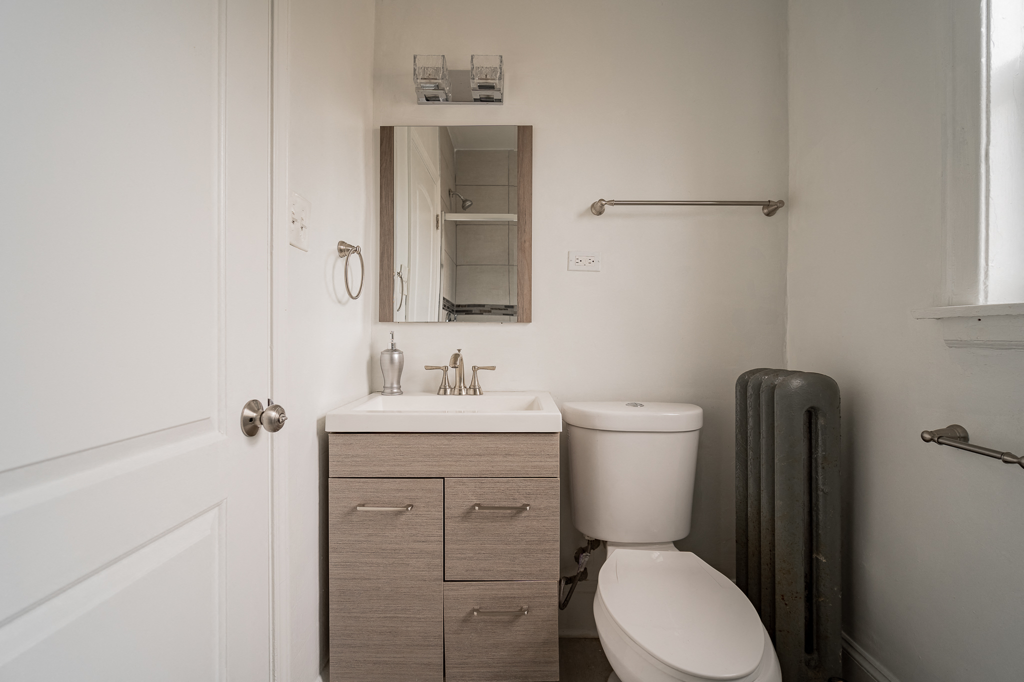 a small bathroom with a toilet and a sink