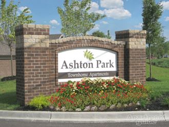 the sign at the entrance to the townhomes apartments