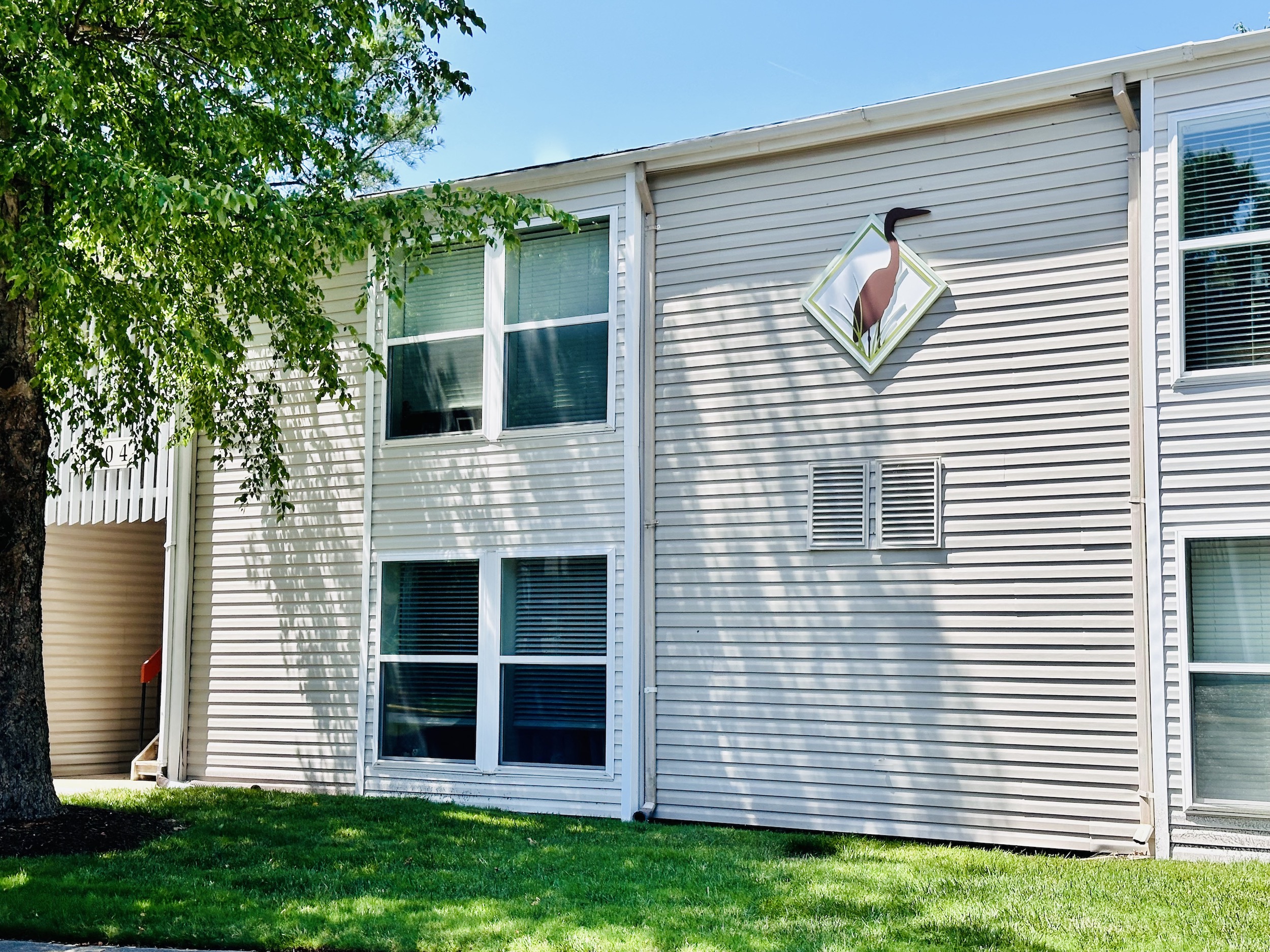 Clean, bright exterior with trees