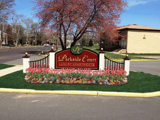 a sign on the side of a street