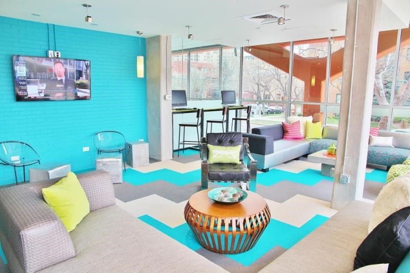 a living room with a couch and a tv