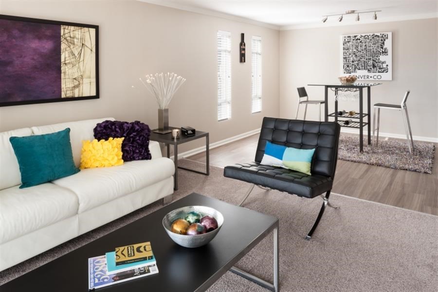 a living room with a couch and a table