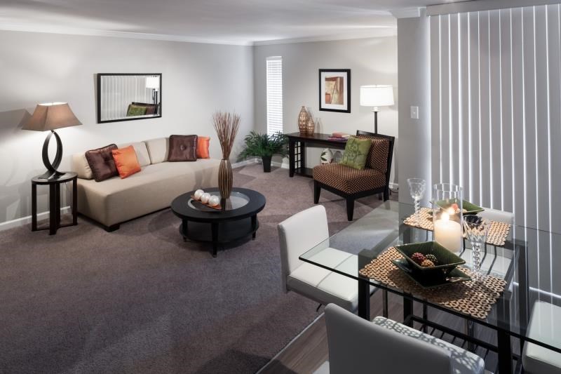 a living room with a couch and a table