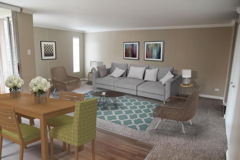 a living room with a couch and a table and chairs