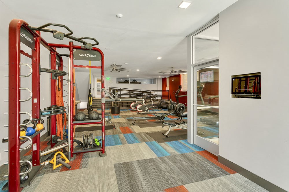 the gym at the flats at big tex apartments