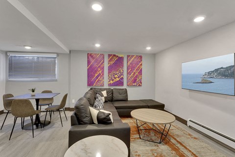 a living room with a couch and a table