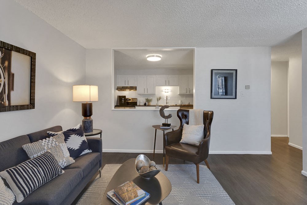 a living room with a couch and a table