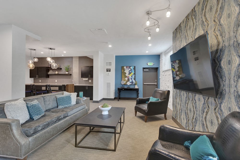 a living room with couches and a table