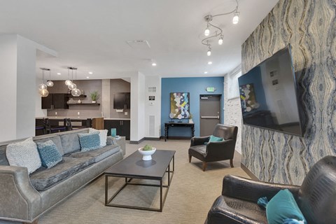 a living room with couches and a table
