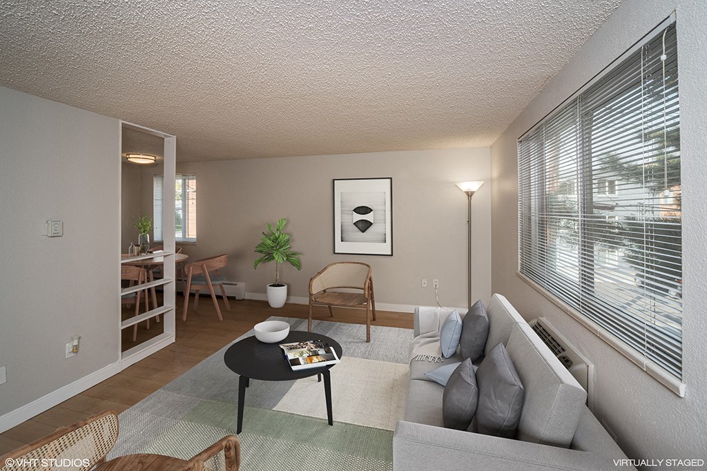 a living room with a couch and a coffee table