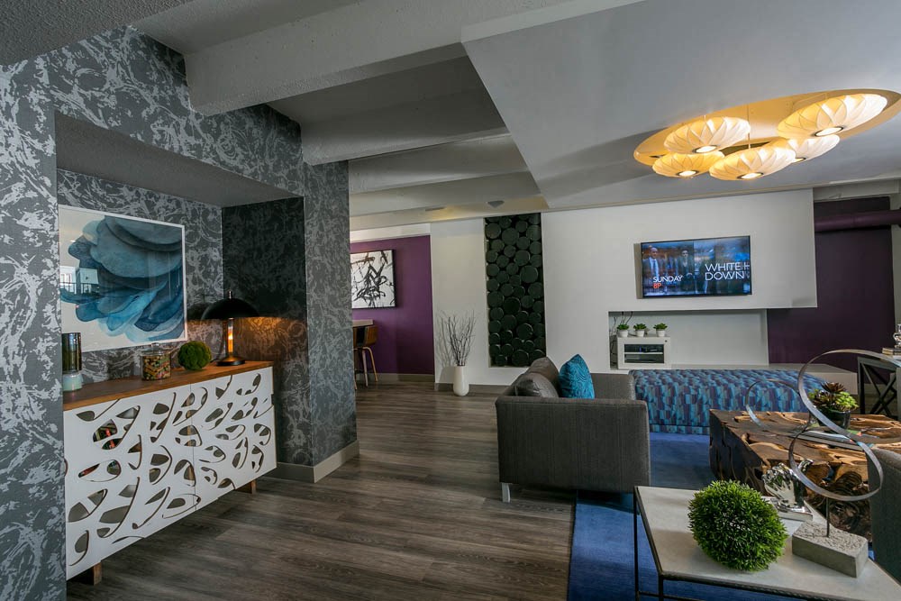 a living room with a couch and a table