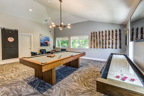Dog-Friendly Apartments in Aliso Viejo, CA - Aliso Creek - Game Room with Billiards Table, Seating Area and Plush Carpeting