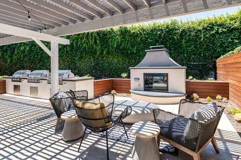 Outdoor fireplace and seating at Aliso Creek, Aliso Viejo, California