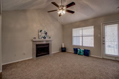 Living Room With Fireplace at Towne Centre Village, Mesquite, Texas