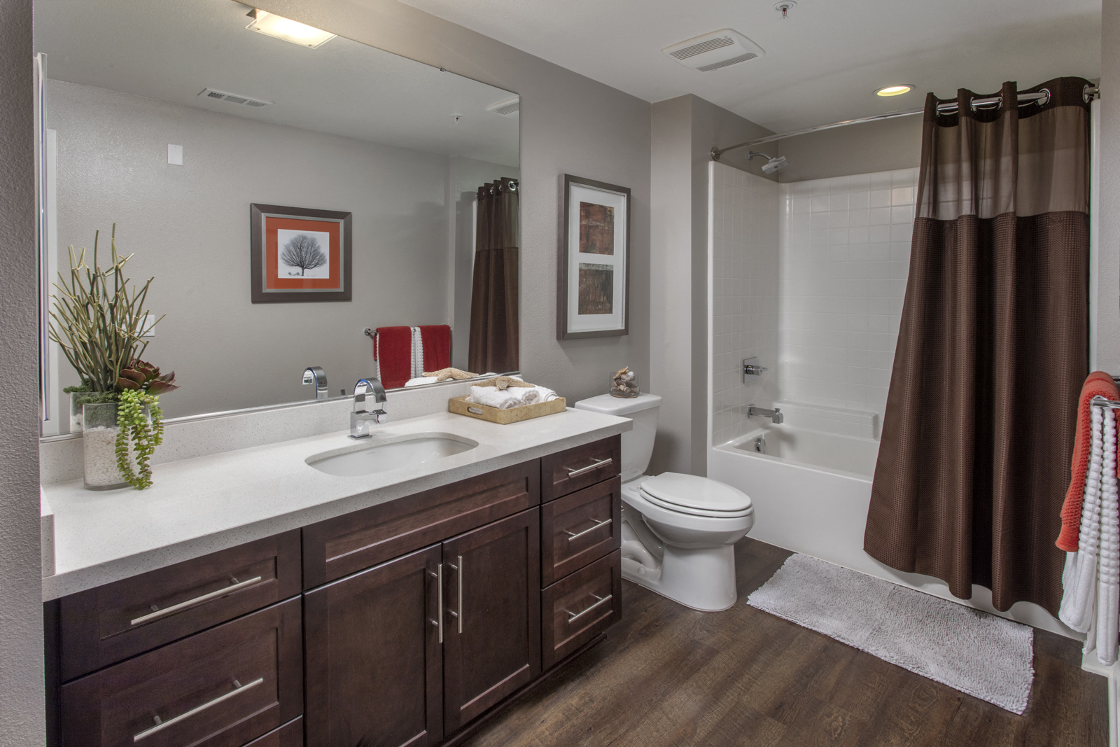 the residence on lamar apartment bathroom with shower sink and toilet