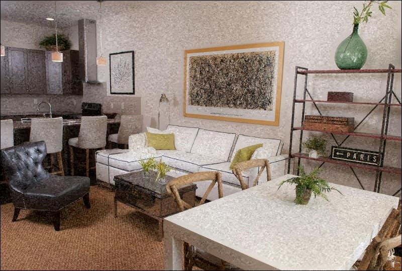 a living room with a white couch and a table