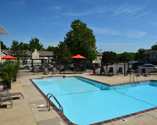 a large swimming pool in the middle of a resort