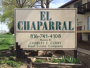 the sign in front of a building