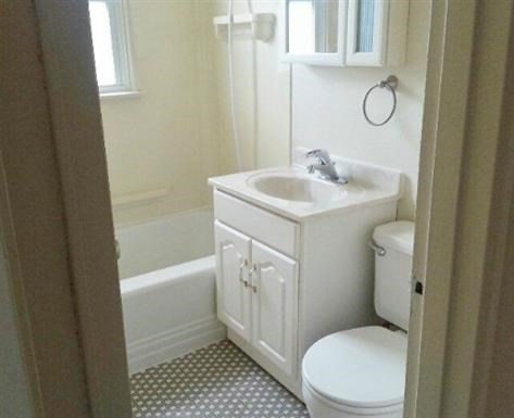 a small bathroom with a toilet and a sink