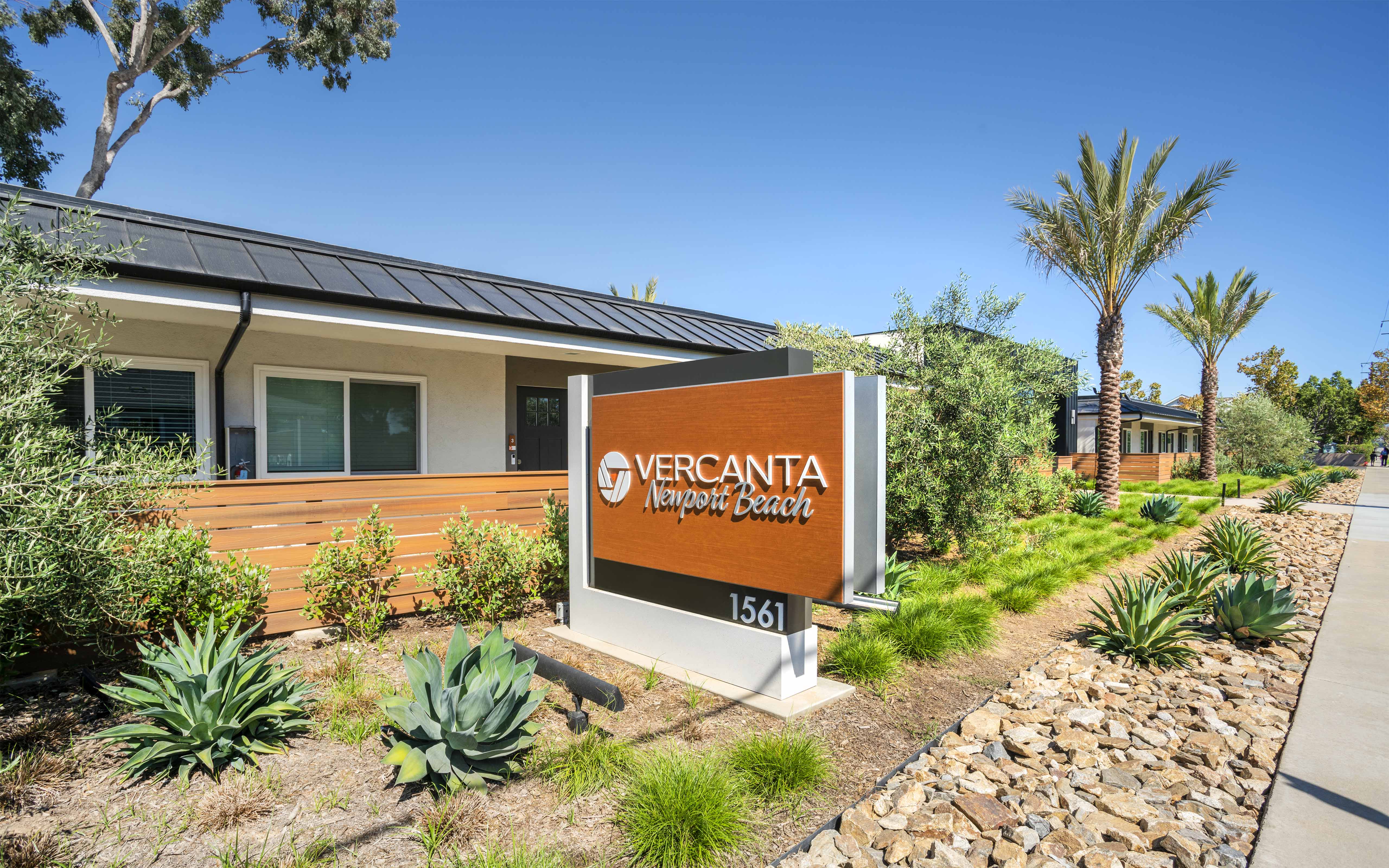 a house with a sign in front of it