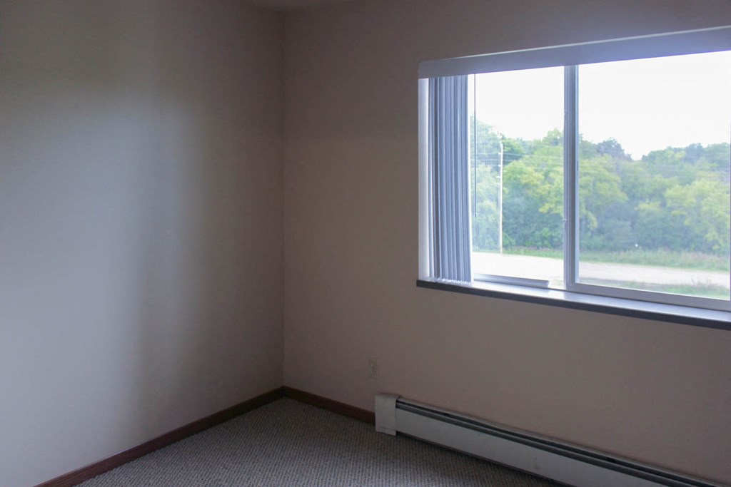 a room with a large window and a