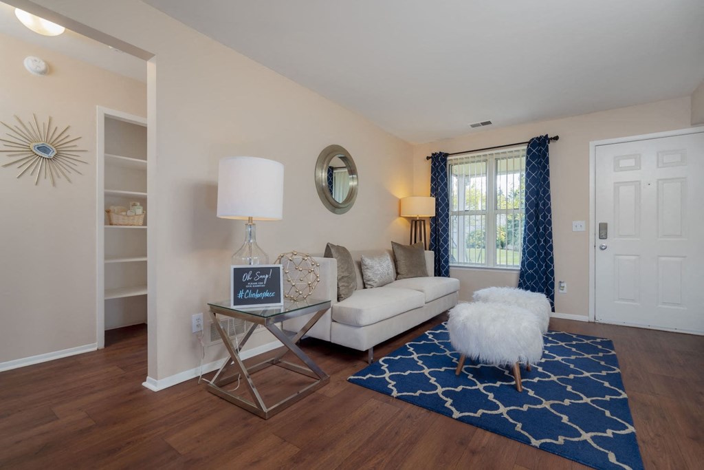 a living room with a couch and a table
