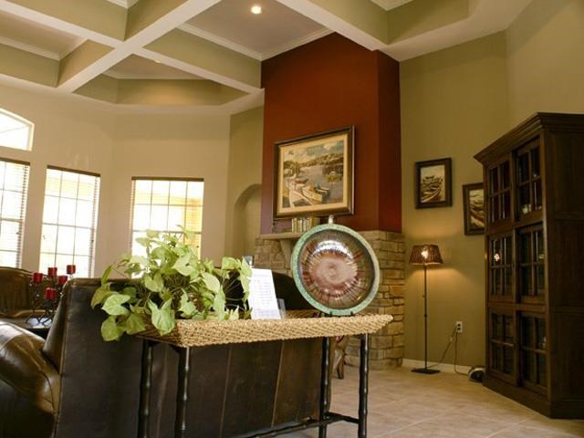 a living room with a table with a plate on it