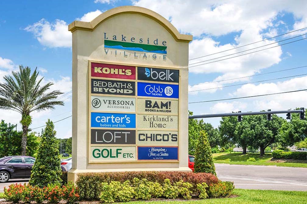 a sign with a bunch of different logos on it