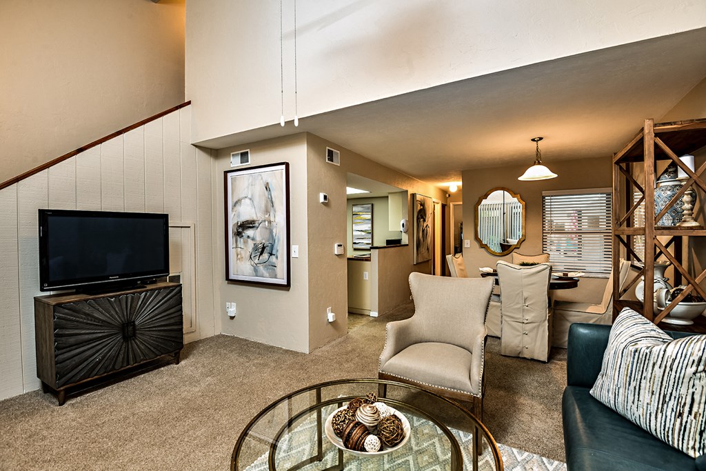 a living room with a couch and a tv