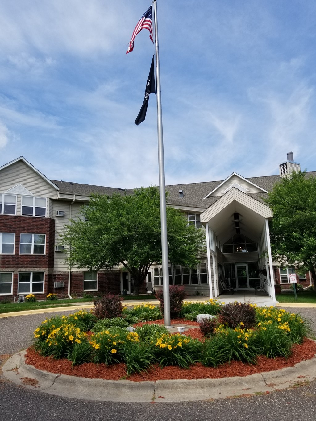 an flag flying in front of a building
