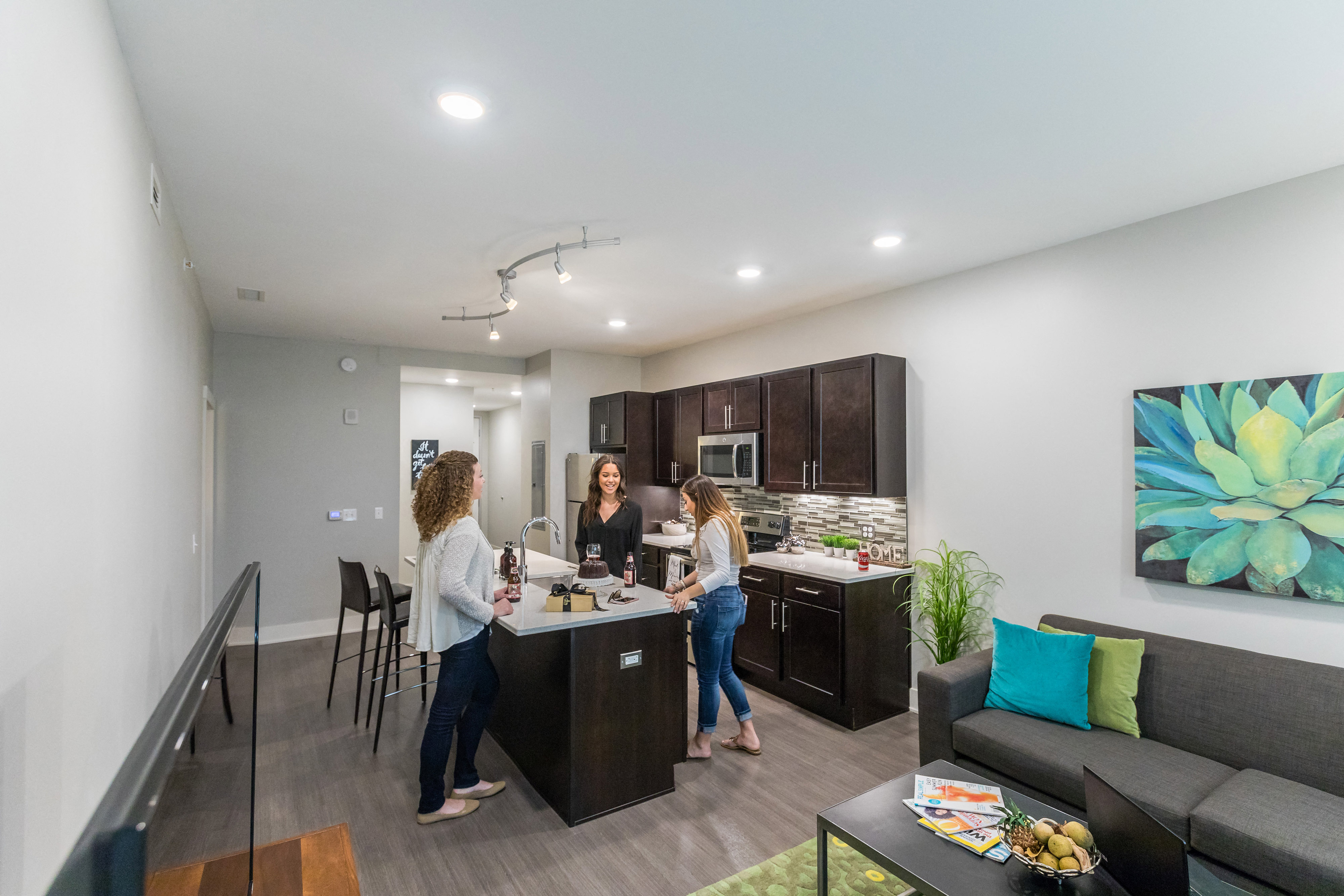 Luxury Finishes in Arena Place Kitchen with Espresso Cabinets