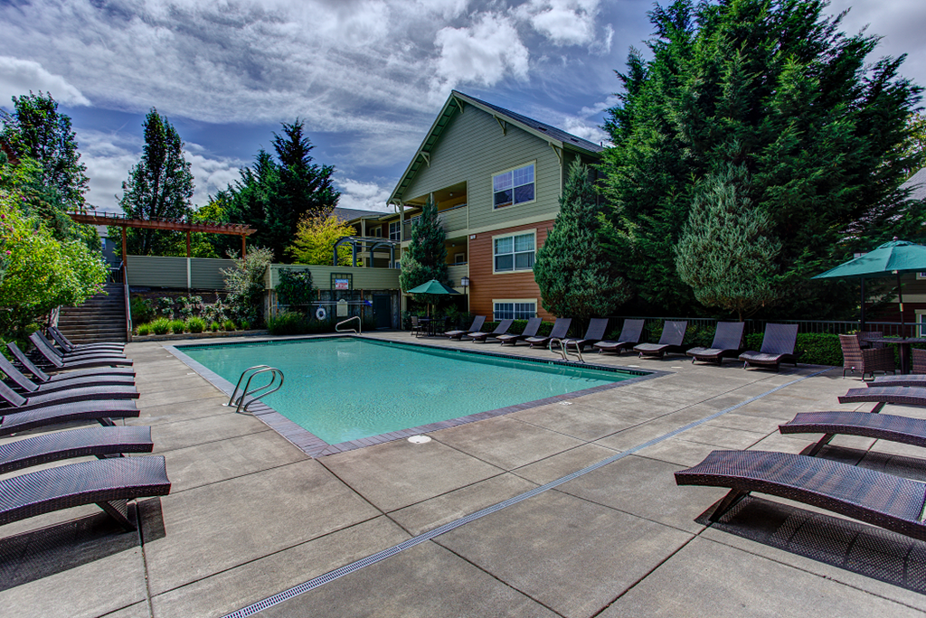Pool area patio at Commons at Sylvan Highlands Apartments, Portland