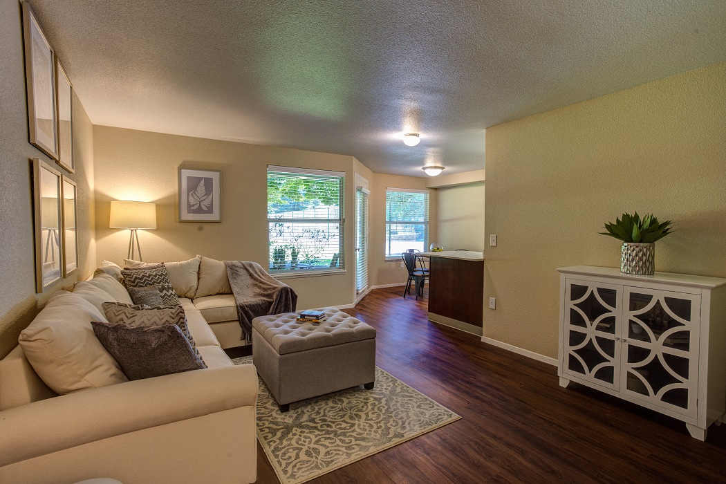 a living room with a couch and a table