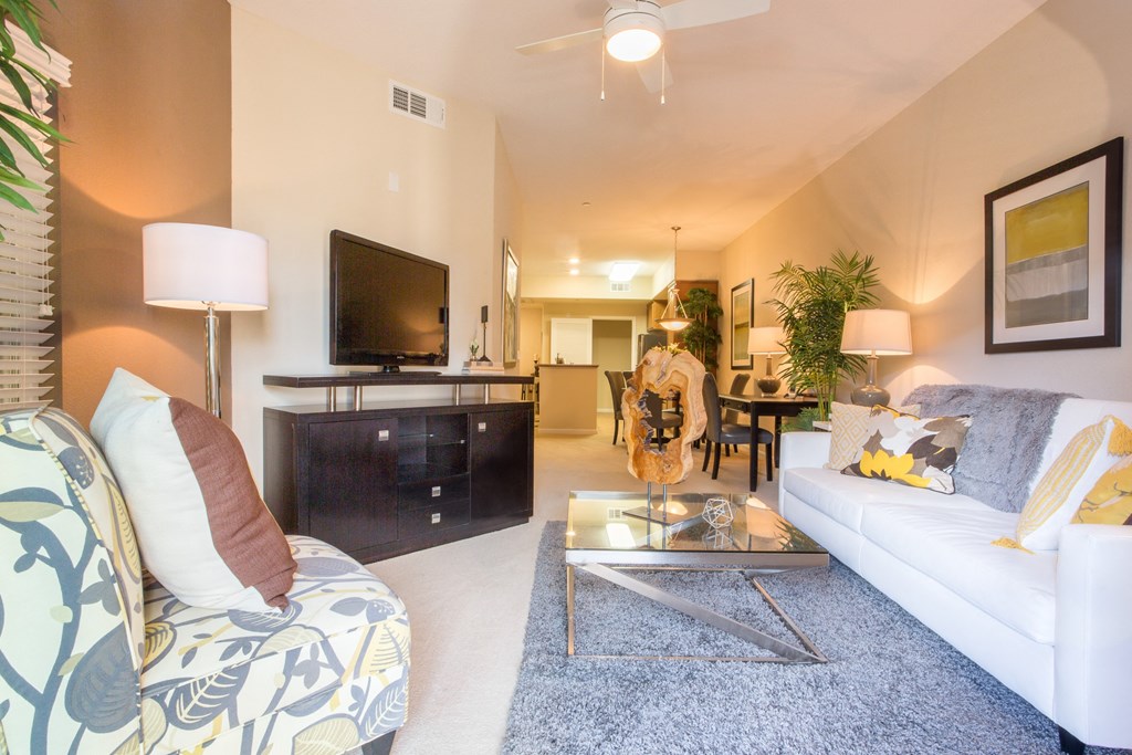 a living room with a couch and a television