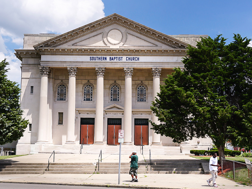 people walking in front
