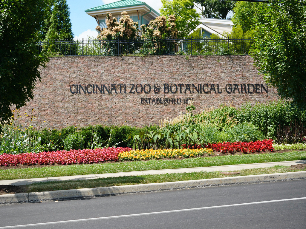 a sign and botanical garden