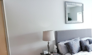 Large private main bedroom! a bedroom with a large bed and a window