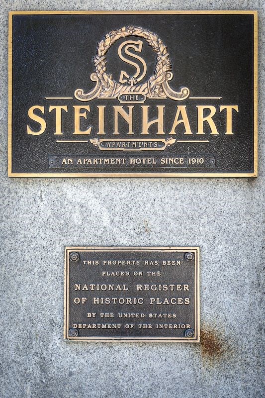 an advertisement for a hotel on the side of a building