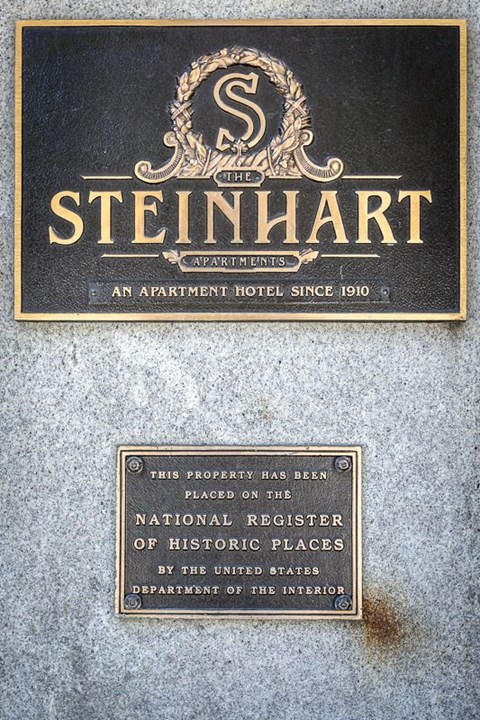 an advertisement for a hotel on the side of a building