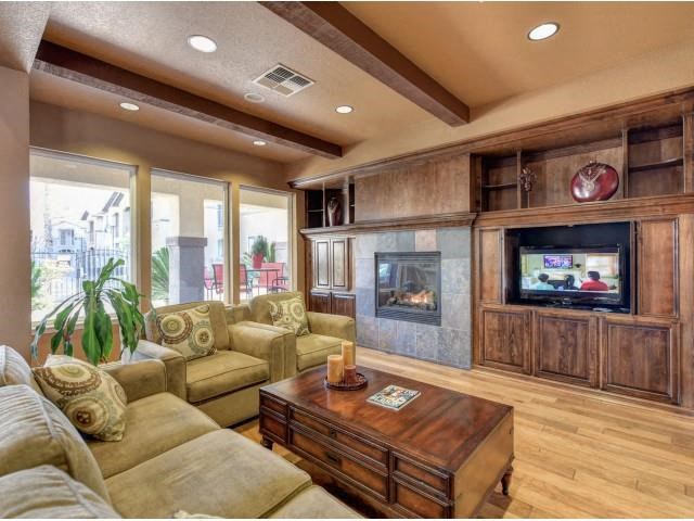 a living room with a couch and a television