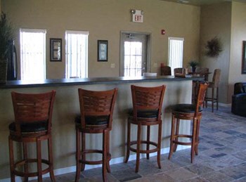 Bar seating in clubhouse Heron Creek Apartments - Photo Gallery 6