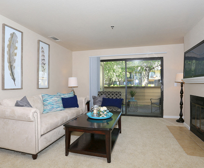 a living room with a couch and a coffee table