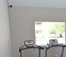 Apartments in Sacramento - Community Fitness Center with a Window, Two Treadmills and Two Ellipticals