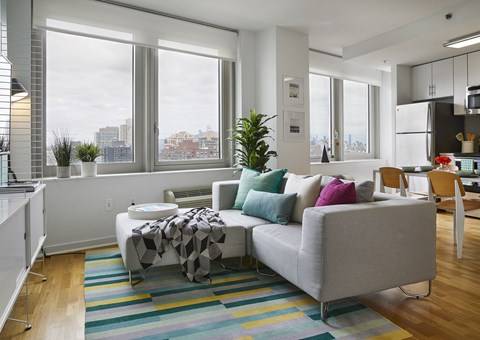 a living room with a couch and a table